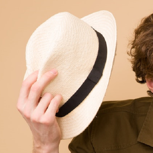 picture-of-man-holding-kentucky-derby-hat