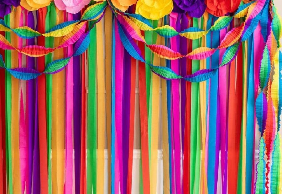 cinco-de-mayo-fiesta-paper-flowers-and-streamers-in-bright-colors-hanging-as-party-decor